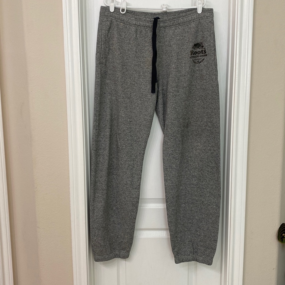 Roots sweatpants. Mens large. Heater Grey. Wear on logo. Good condition